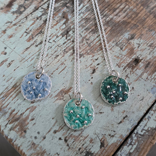 Drivkraft - sølv og emalje