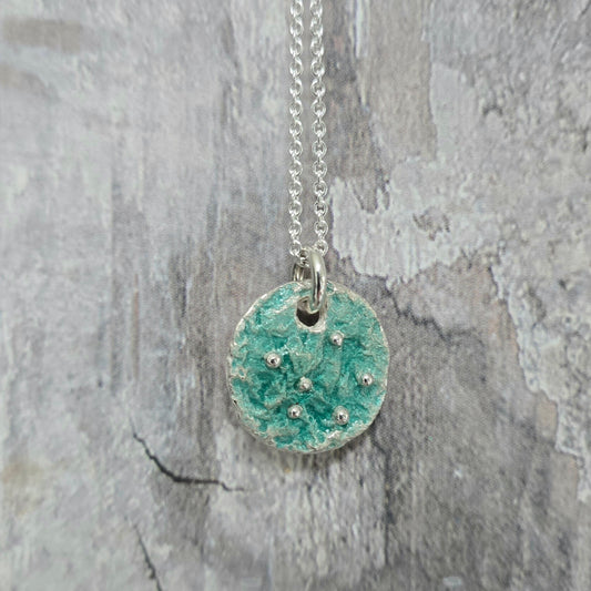 Drivkraft - sølv og emalje